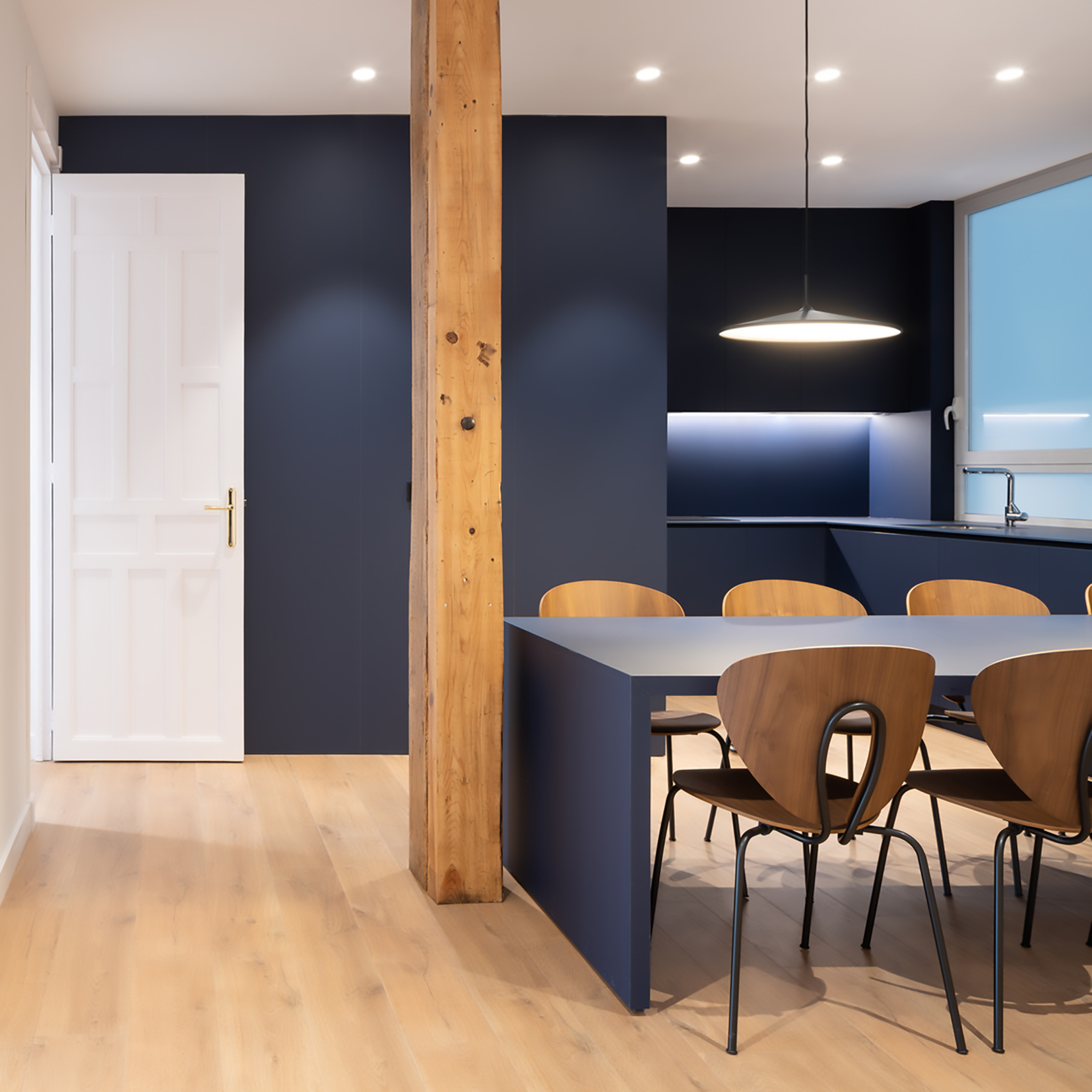 Modern dining table and chairs with illuminating lamps
